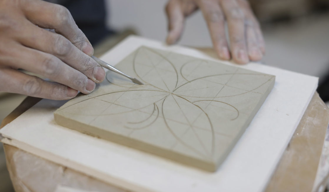 Rich Miller making tiles. Photo Layton Thompson for Ceramic Review