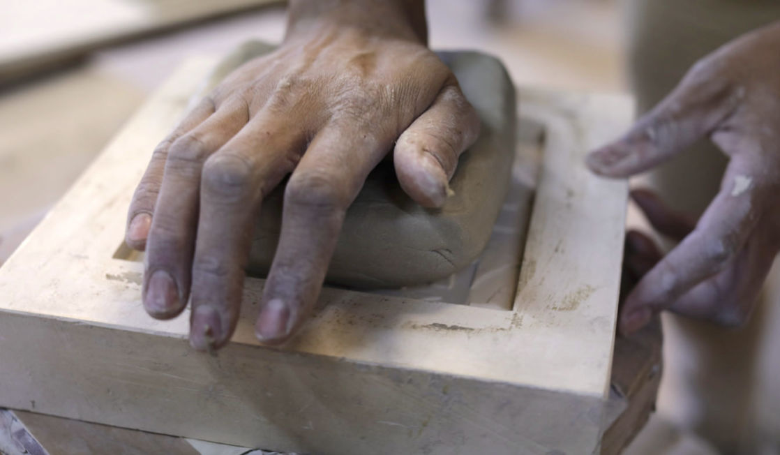 Rich Miller making tiles. Photo Layton Thompson for Ceramic Review