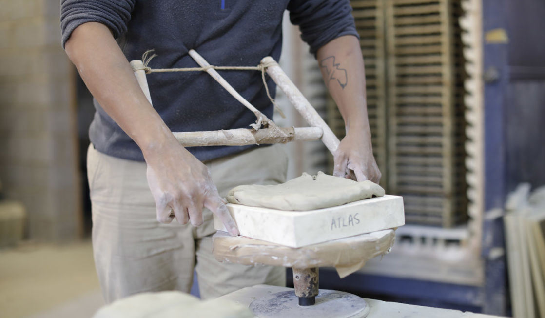 Rich Miller making tiles. Photo Layton Thompson for Ceramic Review